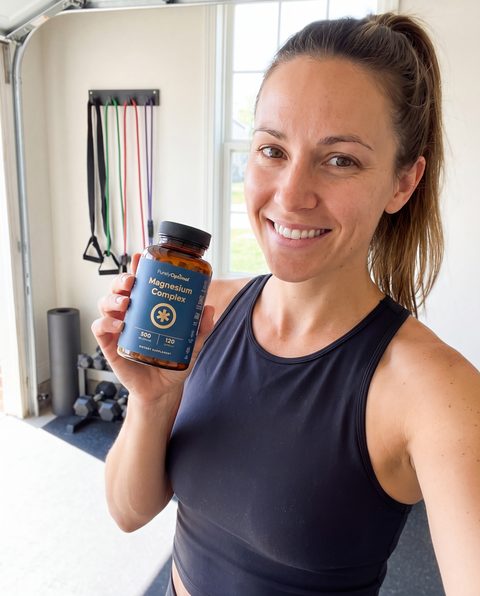A Purely Optimal customer holding their Magnesium Complex